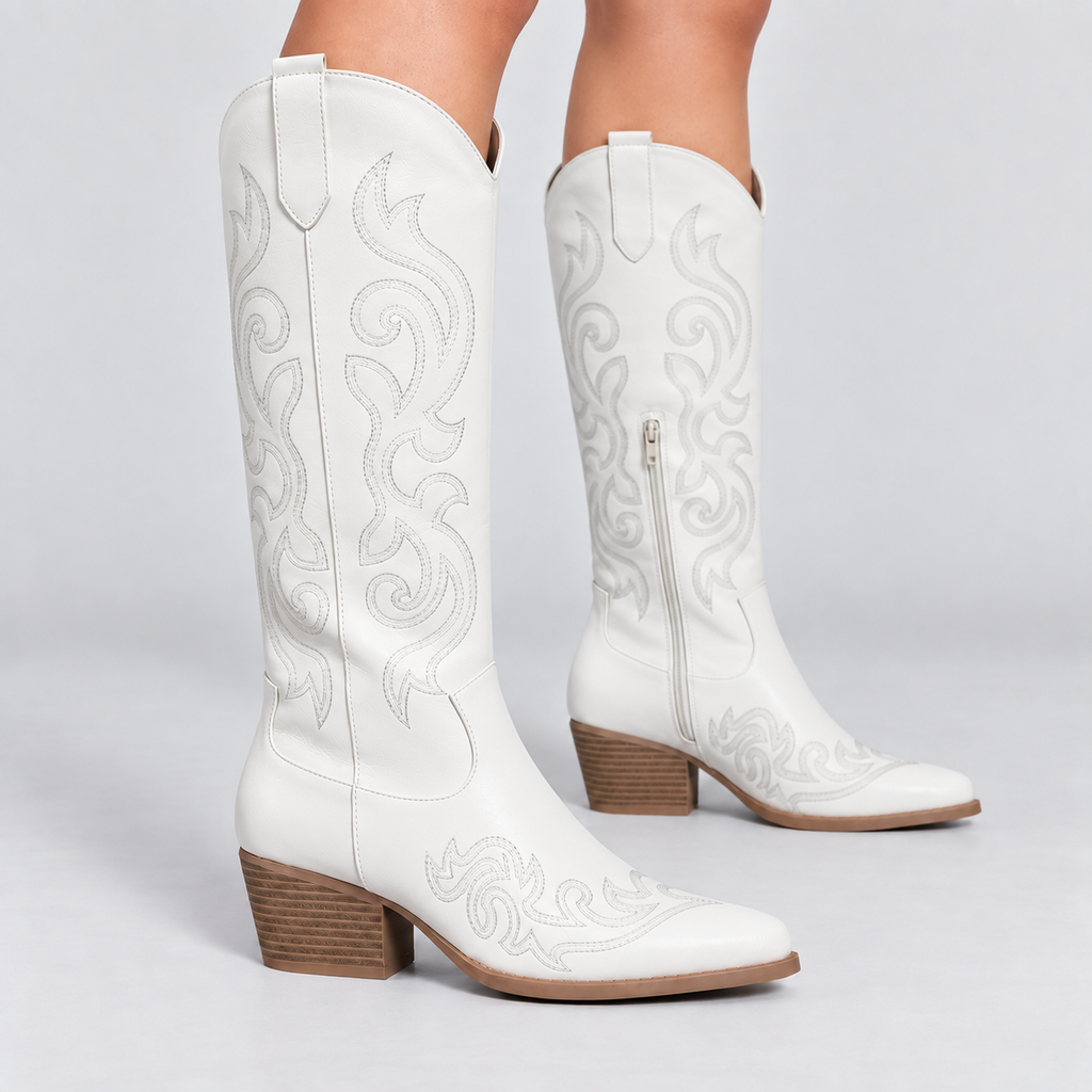 Grace embroidered knee-high western boots in white, angled view