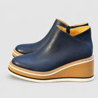 Women's Zip-Up Wedge Ankle Boots in Blue — view 7