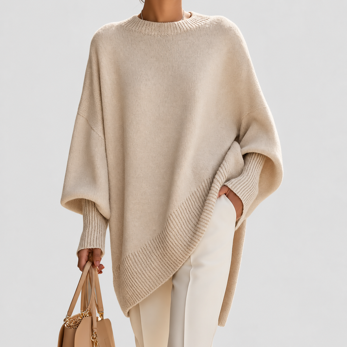 Women's Oversized Asymmetric Hem Jumper in Beige — view 1