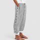 Evelise | Women's Relaxed Striped Trousers with Button Detail and Side Pockets