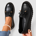 Women's Bow-Detail Slip-On Loafers with Ridged Sole in Black — view 1