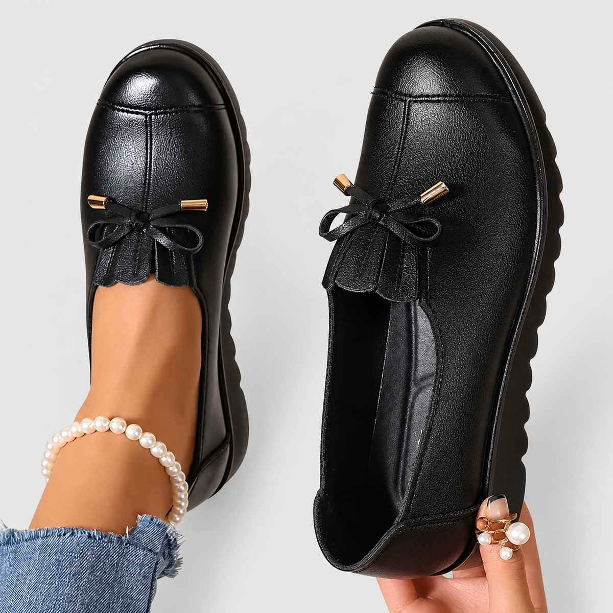 Women's Bow-Detail Slip-On Loafers with Ridged Sole in Black — view 1