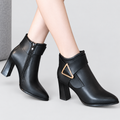 Women's Pointed-Toe Faux Leather Ankle Boots with Gold-Tone Triangle Buckle in Black — view 3