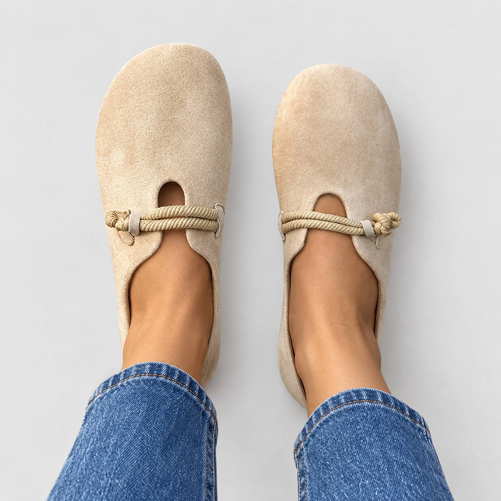 Round-toe loafers with rope detail in beige, front view on model