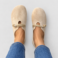 Round-toe loafers with rope detail in beige, front view on model