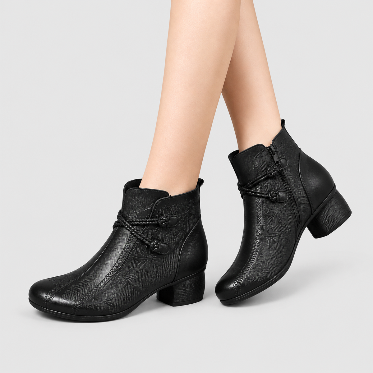 Women's Faux Leather Block-Heel Ankle Boots with Leaf Detail in Black — view 1