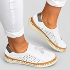 Women's Perforated Tassel Slip-On Trainers in White — view 3