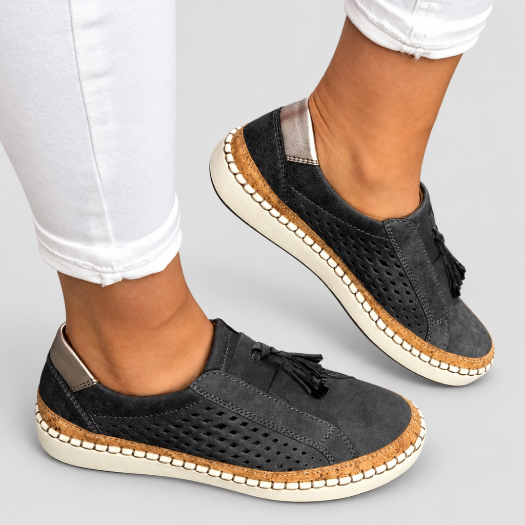 Women's Perforated Tassel Slip-On Trainers in Black — view 5